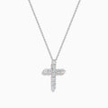 The 14K White Gold Diamond Cross Pendant features a delicate white gold chain and a cross encrusted with sparkling round diamonds, shown against a plain white background.