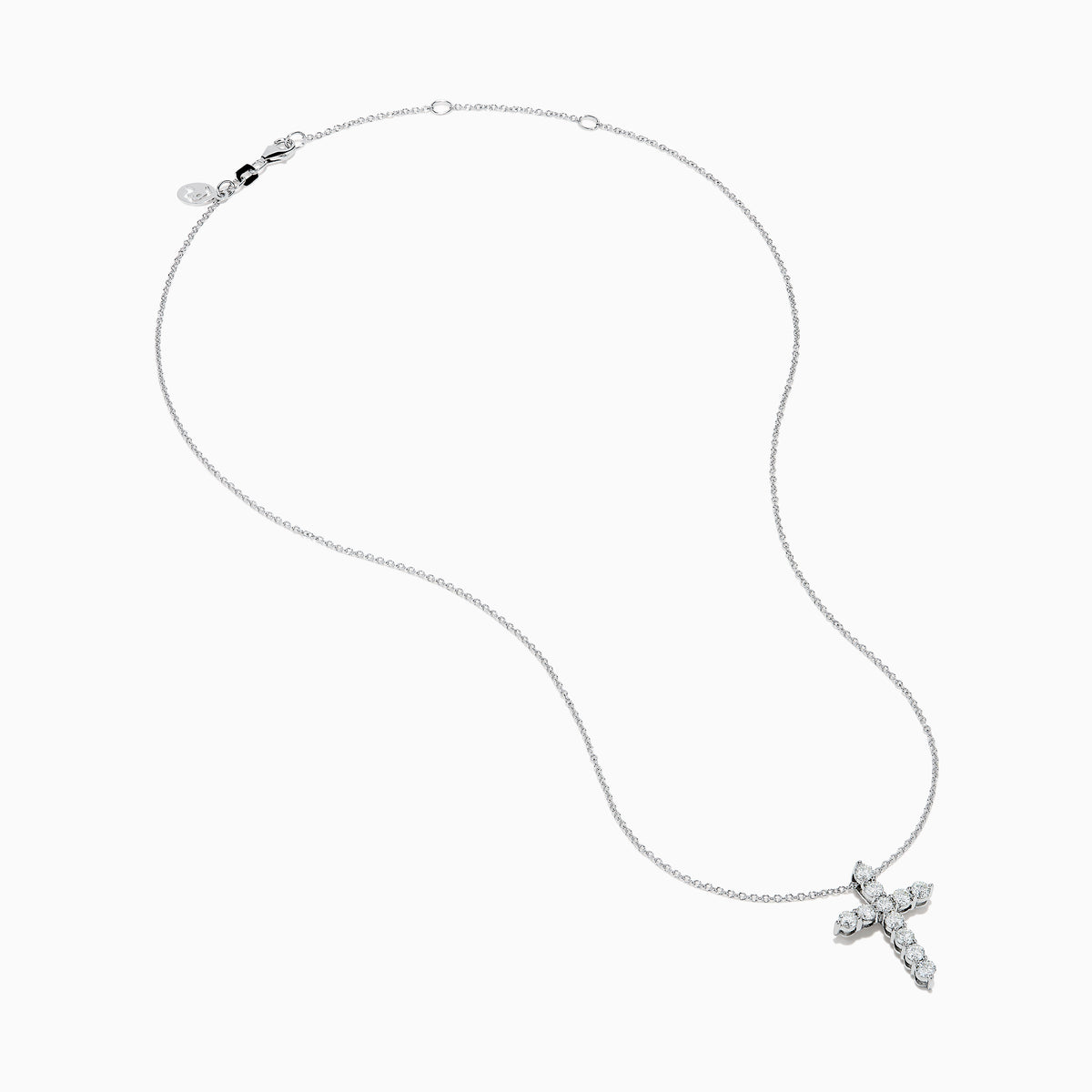 The 14K White Gold Diamond Cross Pendant features a delicate white gold chain and a cross encrusted with sparkling round diamonds, shown against a plain white background.