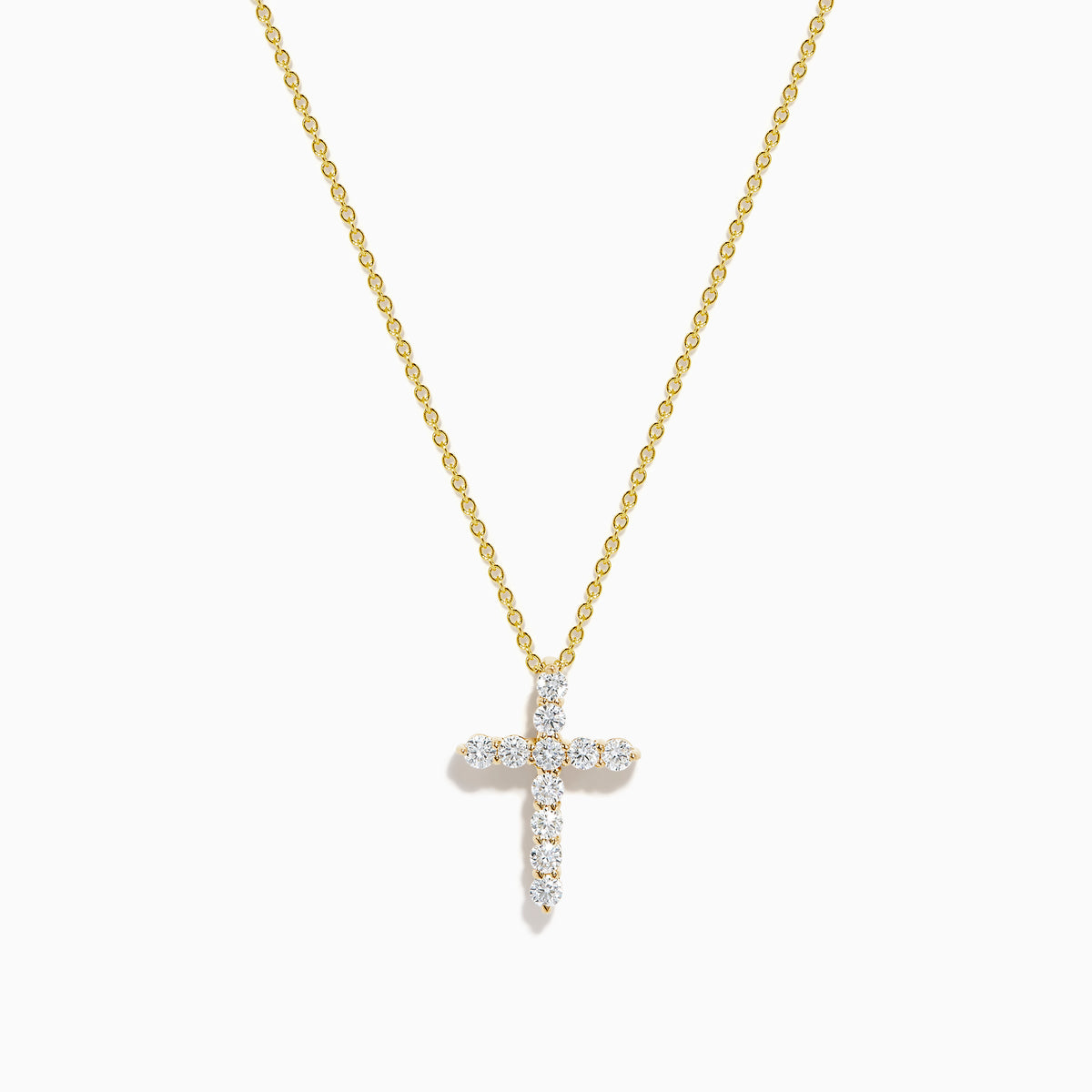 The 14K Yellow Gold Diamond Cross Pendant features small round diamonds on a yellow gold chain, showcased against a plain white background.