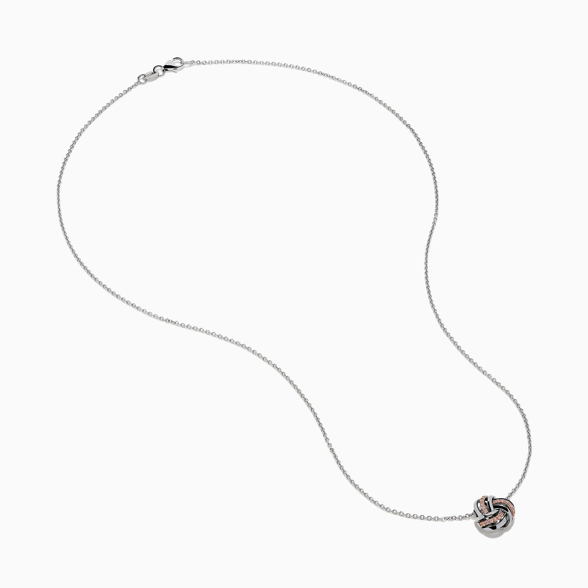 The 14K White Gold Pink Diamond Love Knot Pendant features intertwined rose gold and white gold tones with a polished, textured finish, delicately centered on a silver chain.