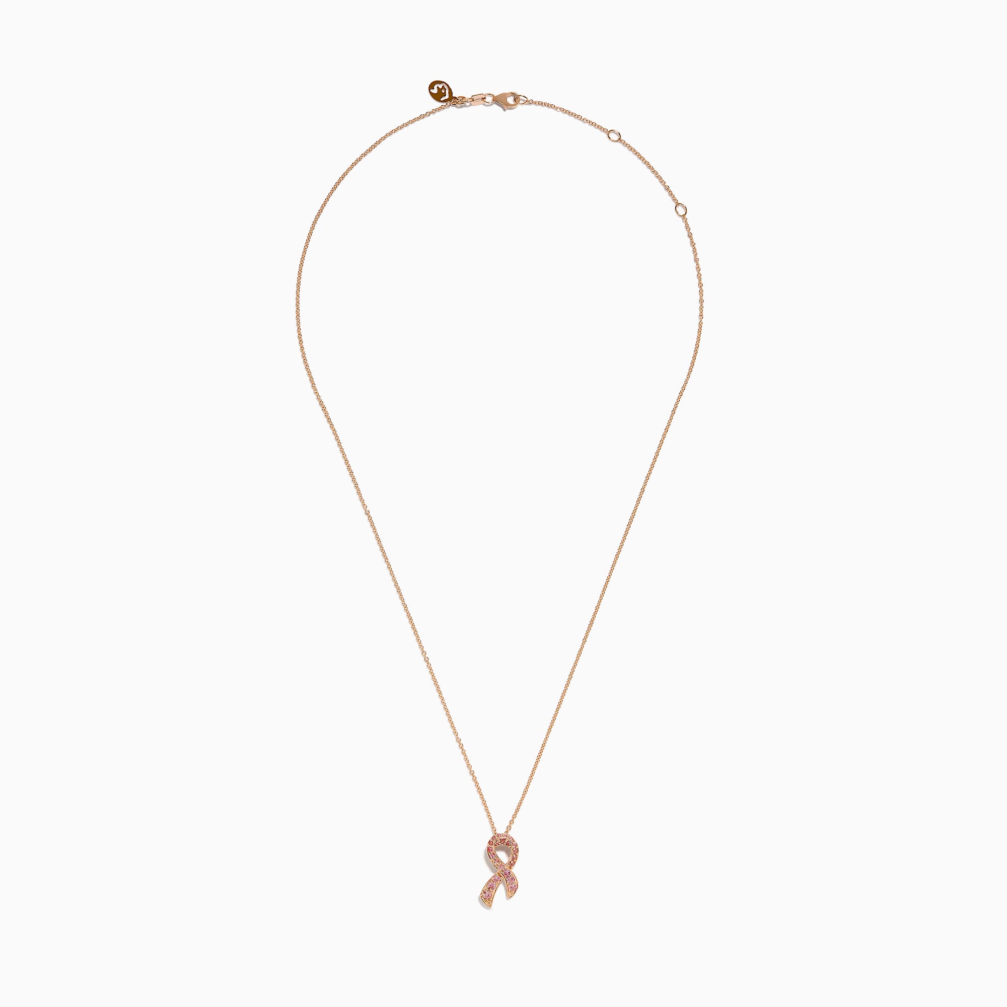 The 14K Rose Gold Pink Sapphire Ribbon Pendant features a pink ribbon-shaped charm encrusted with sparkling pink sapphires on a gold chain, displayed on a white background for a delicate, feminine look.