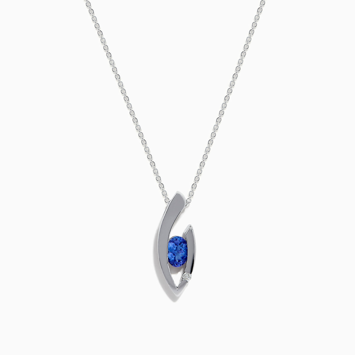 Elegant 14K white gold pendant featuring a curved design and centered with a round blue tanzanite, accented by diamonds, shown on a white background.