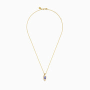 The Nahla Effy 14K Yellow Gold Pendant features a modern abstract design with an oval blue tanzanite gemstone and a small diamond accent.