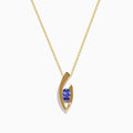 The Nahla Effy 14K Yellow Gold Pendant features a modern abstract design with an oval blue tanzanite gemstone and a small diamond accent.