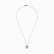 The Watercolors 14K White Gold Multi Color Sapphire and Diamond Star of David Pendant features six sapphires in red, orange, yellow, green, blue, and purple. It hangs from a delicate silver chain against a white background.