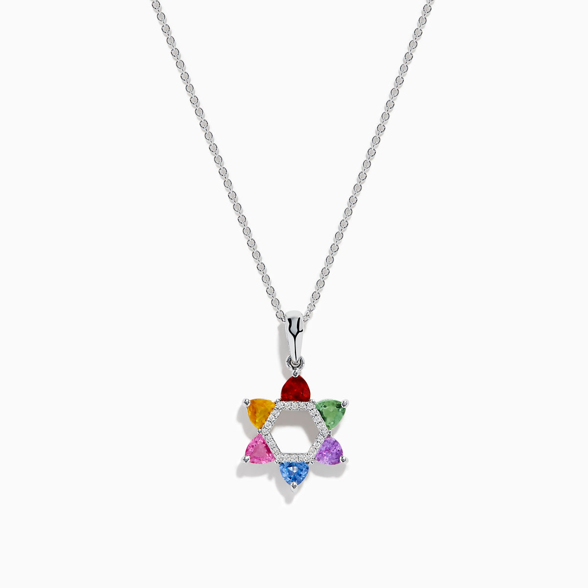 The Watercolors 14K White Gold Multi Color Sapphire and Diamond Star of David Pendant features six sapphires in red, orange, yellow, green, blue, and purple. It hangs from a delicate silver chain against a white background.