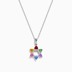 The Watercolors 14K White Gold Multi Color Sapphire and Diamond Star of David Pendant features six sapphires in red, orange, yellow, green, blue, and purple. It hangs from a delicate silver chain against a white background.