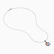 The Watercolors 14K White Gold Multi Color Sapphire and Diamond Star of David Pendant features six sapphires in red, orange, yellow, green, blue, and purple. It hangs from a delicate silver chain against a white background.