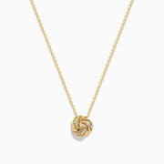 The 14K Yellow Gold Diamond Love Knot Pendant features intertwined loops with small, sparkling diamonds, creating an elegant look. Shown against a white background on a gold chain necklace.