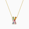 The Watercolors 14K Yellow Gold Diamond Multi Color Sapphire X Pendant is a chain necklace featuring a large X-shaped pendant adorned with multicolored sapphires and bordered with diamonds.