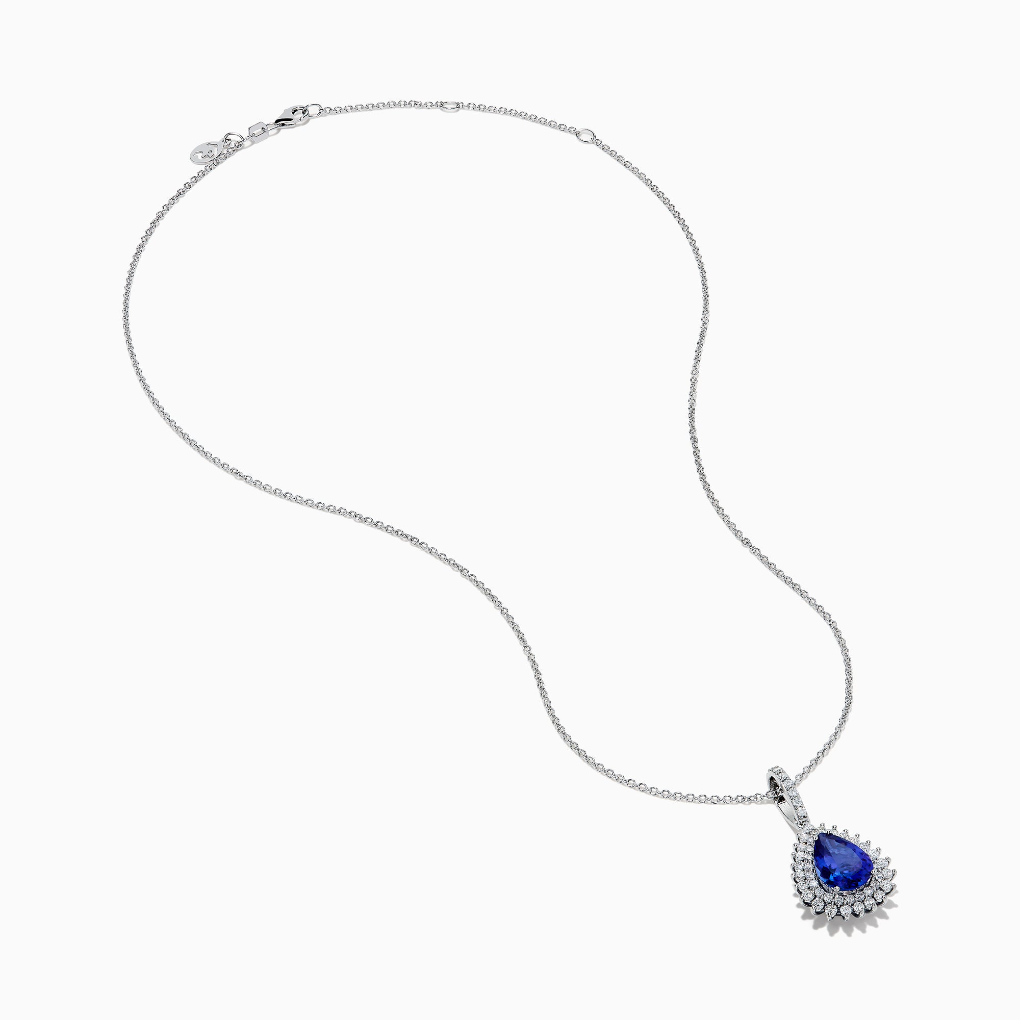 A 14K white gold pear tanzanite and diamond halo pendant with a diamond-studded bail, displayed on a white background.