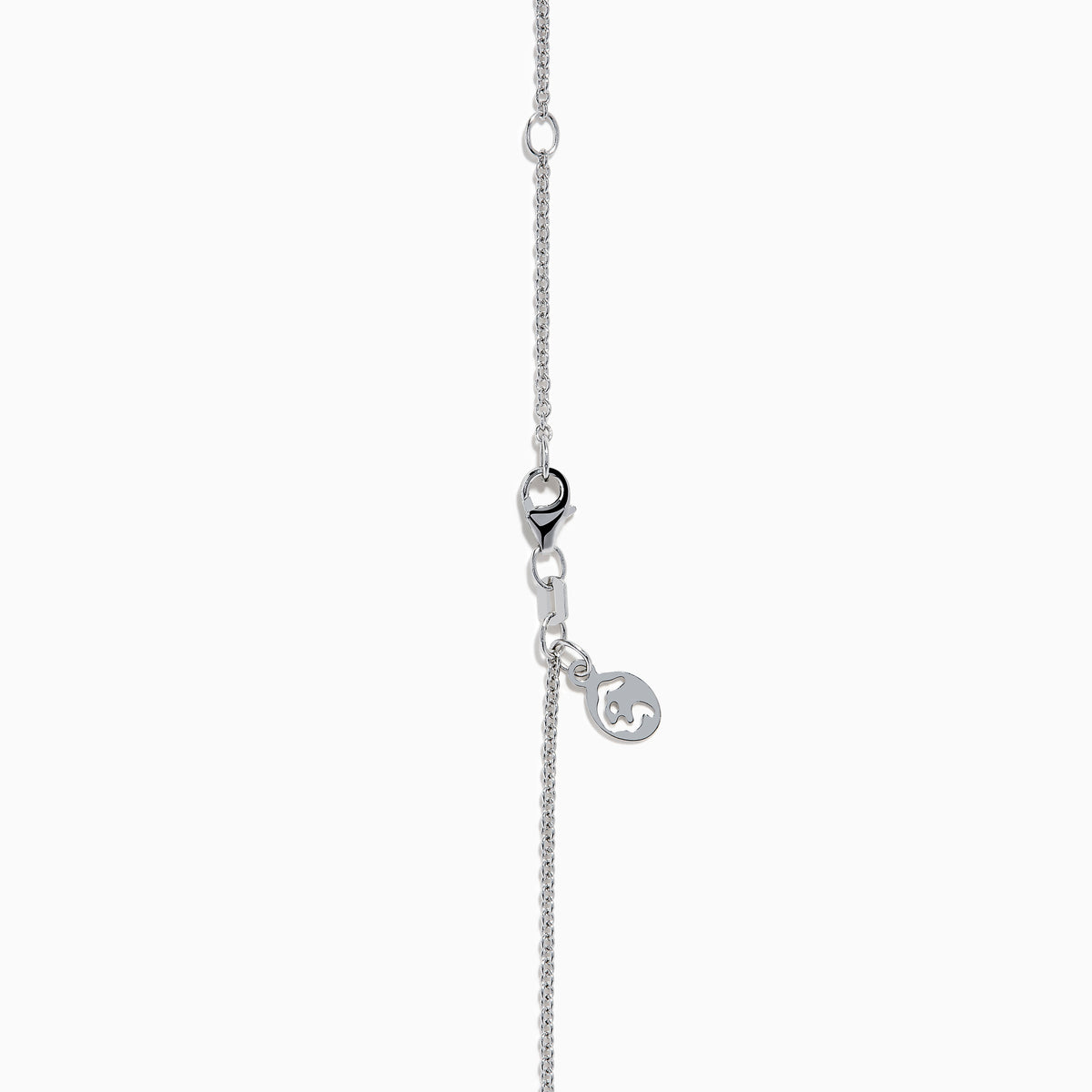 A 14K white gold pear tanzanite and diamond halo pendant with a diamond-studded bail, displayed on a white background.