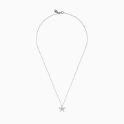 The Novelty 14K White Gold Diamond Starfish Pendant features a starfish-shaped design encrusted with sparkling diamonds, beautifully displayed on a plain white background.