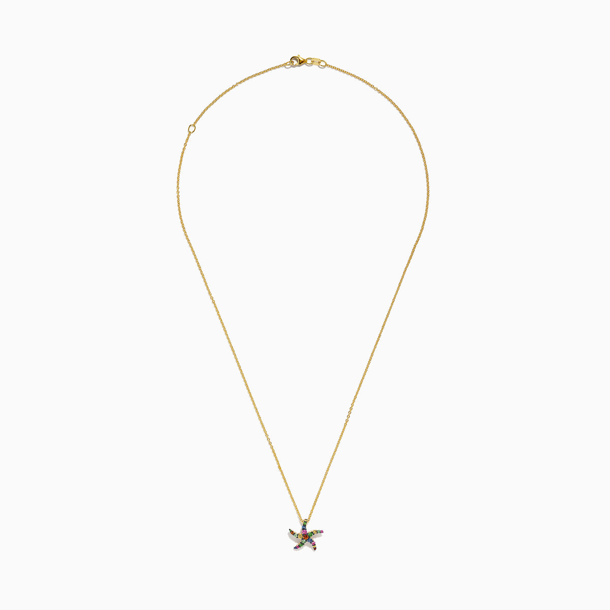 The Seaside 14K Yellow Gold Multi Sapphire Starfish Pendant features a delicate gold chain with a sapphire starfish-shaped pendant adorned with multicolored gemstones, shown elegantly against a white background.
