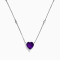 The Aquarius 14K White Gold Aquamarine and Diamond Heart Necklace features a heart-shaped aquamarine pendant with two small round diamonds set along its delicate chain.