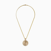 The 14K Yellow Gold Diamond Concentric Circle Drop Pendant features concentric circles with diamond accents and a central diamond, all suspended from a yellow gold chain.