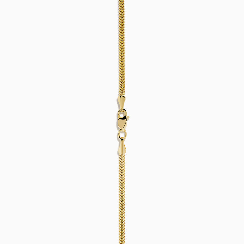 The 14K Yellow Gold Diamond Concentric Circle Drop Pendant features concentric circles with diamond accents and a central diamond, all suspended from a yellow gold chain.
