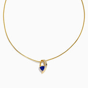 The Nahla Siri 14K Yellow Gold Tanzanite and Diamond Necklace features a delicate chain and a blue tanzanite gemstone pendant, accented with sparkling diamonds, displayed on a white background.