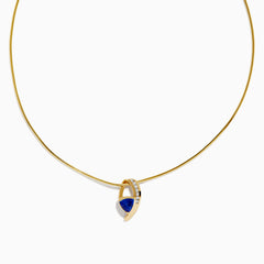 The Nahla Siri 14K Yellow Gold Tanzanite and Diamond Necklace features a delicate chain and a blue tanzanite gemstone pendant, accented with sparkling diamonds, displayed on a white background.