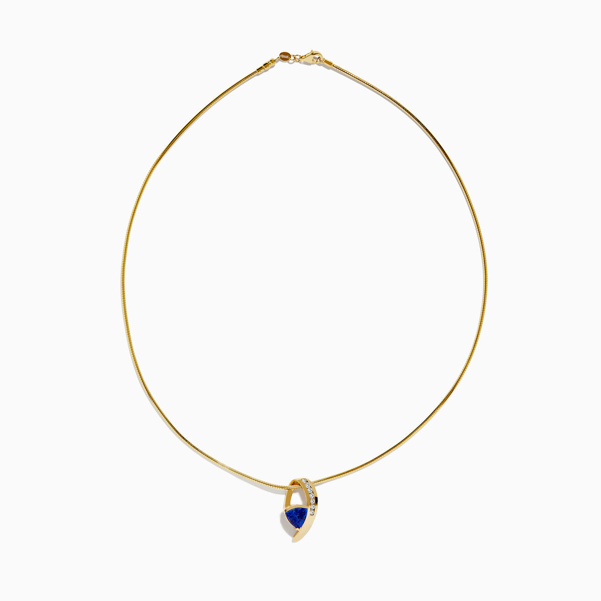 The Nahla Siri 14K Yellow Gold Tanzanite and Diamond Necklace features a delicate chain and a blue tanzanite gemstone pendant, accented with sparkling diamonds, displayed on a white background.