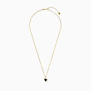 The 14K Yellow Gold Garnet and Diamond Pendant features a deep red, triangular garnet accented with small diamonds in a curved, asymmetrical design.