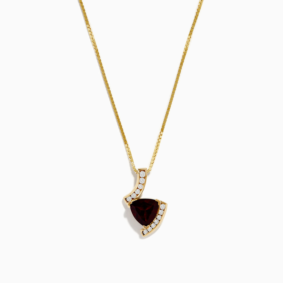 The 14K Yellow Gold Garnet and Diamond Pendant features a deep red, triangular garnet accented with small diamonds in a curved, asymmetrical design.