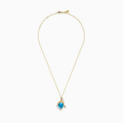 The Ocean Bleu 14K Yellow Gold Pendant features a triangular blue topaz accented with a curved row of small white diamonds and gold lines, suspended from a fine gold chain.
