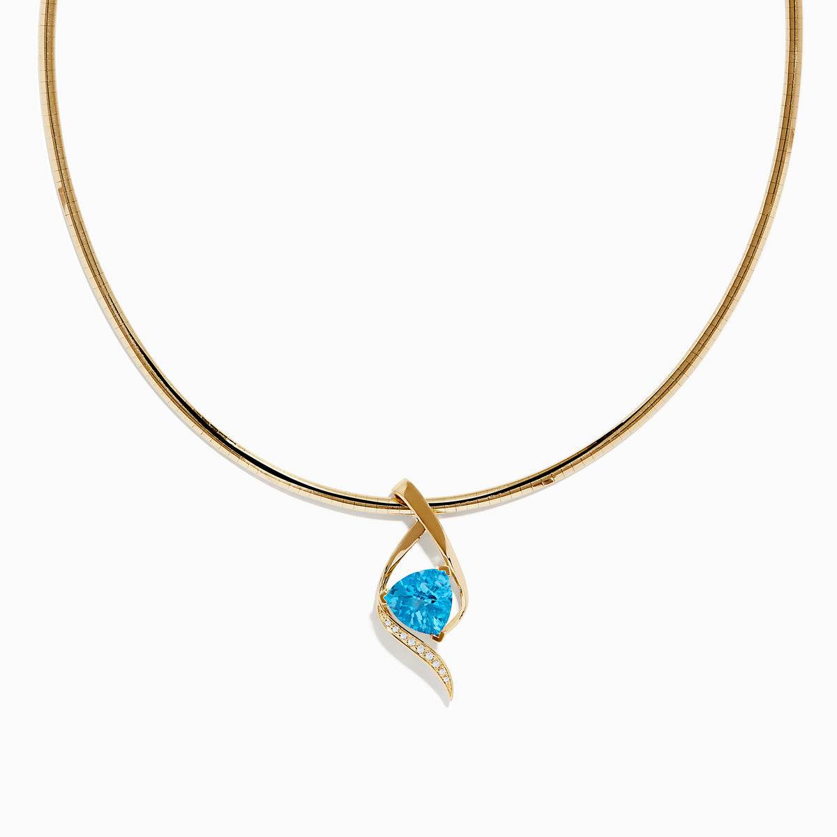The Ocean Bleu 14K Yellow Gold Blue Topaz and Diamond Pendant features a twisting diamond design, centered with a vivid blue topaz and accented by small diamonds along one side, displayed on a plain white background.