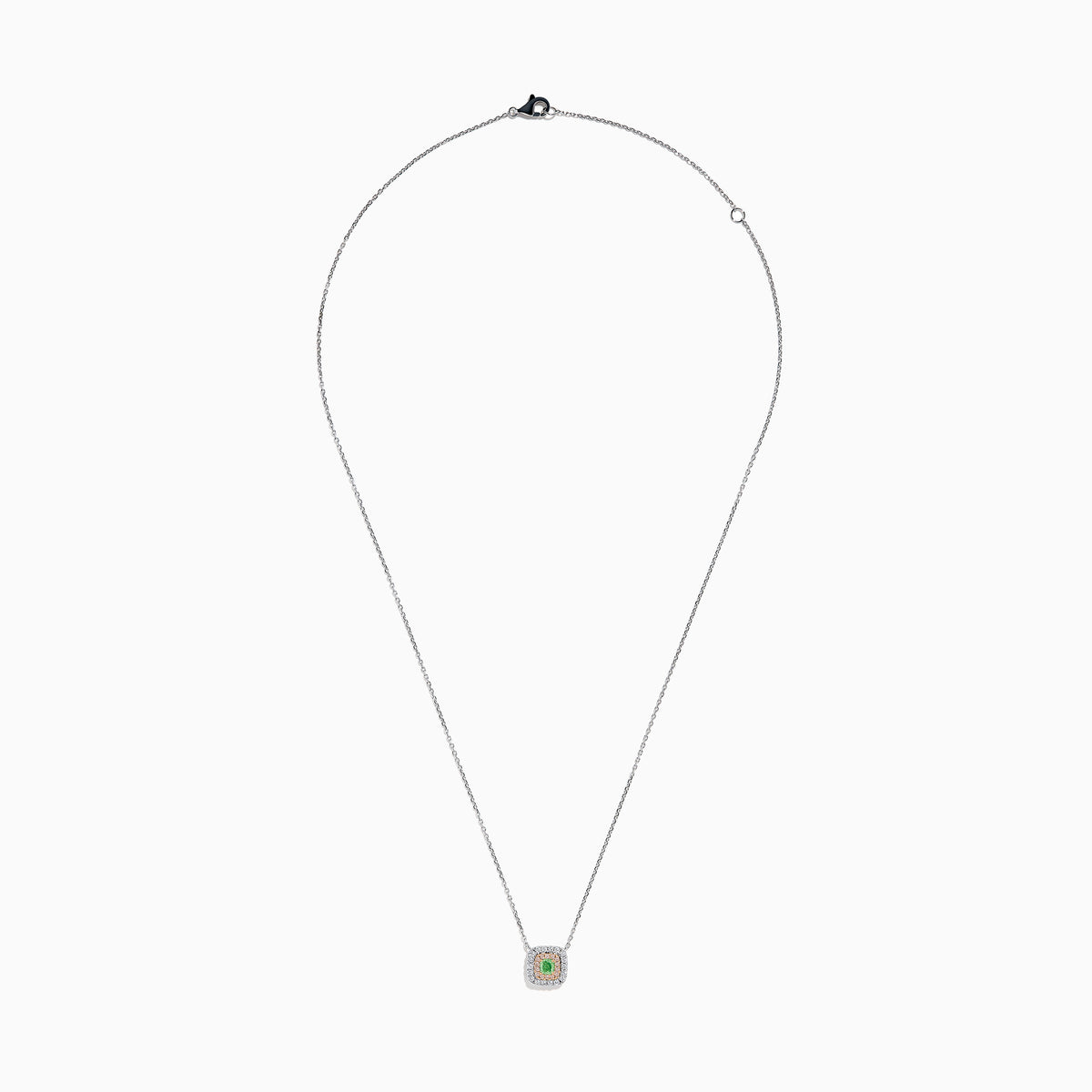 The 18K Two-Tone Gold Green and White Diamond Halo Necklace features a square pendant with a central green gemstone, accented by a double halo of sparkling white diamonds on a delicate chain.