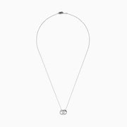 The 14K White Gold Diamond Accented Interlocking Hearts Necklace features two intertwined hearts—one with sparkling diamond accents, the other polished smooth—set on a plain white background.