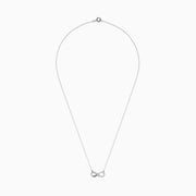The 14K White Gold Diamond Accented Infinity Necklace features a sparkling infinity symbol pendant and is shown on a plain white background.