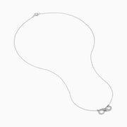 The 14K White Gold Diamond Accented Infinity Necklace features a sparkling infinity symbol pendant and is shown on a plain white background.