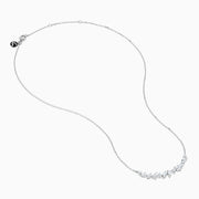 The Lab Grown Multi Shape Diamond Collarbone Necklace in 14K White Gold features a row of marquise and round lab grown diamonds arranged in a graceful curve along the center of the chain.