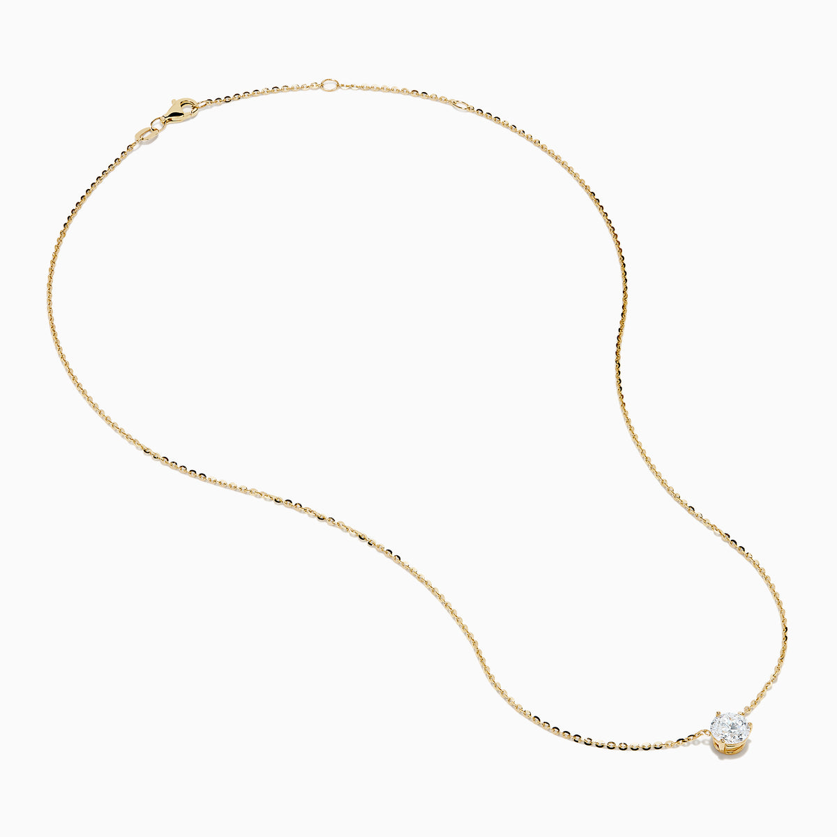 The Lab Grown Diamond 1.00ct Solitaire Pendant in 14K Yellow Gold features a single lab-grown diamond on a delicate gold chain, showcased against a white background.