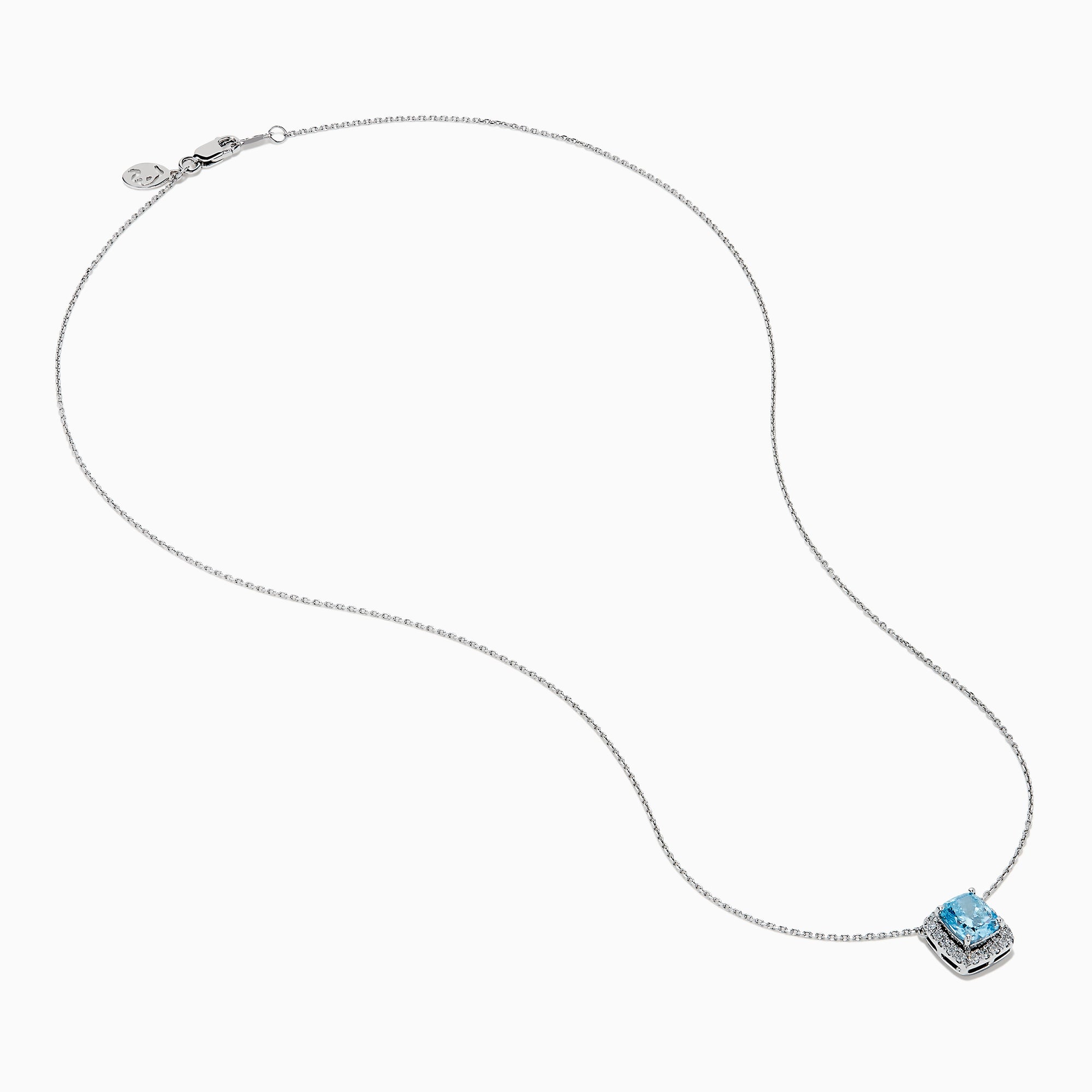 The Lab Grown Blue and White Diamond Halo Necklace in 14K White Gold features a square blue and white diamond pendant surrounded by clear stones, elegantly displayed against a white background.