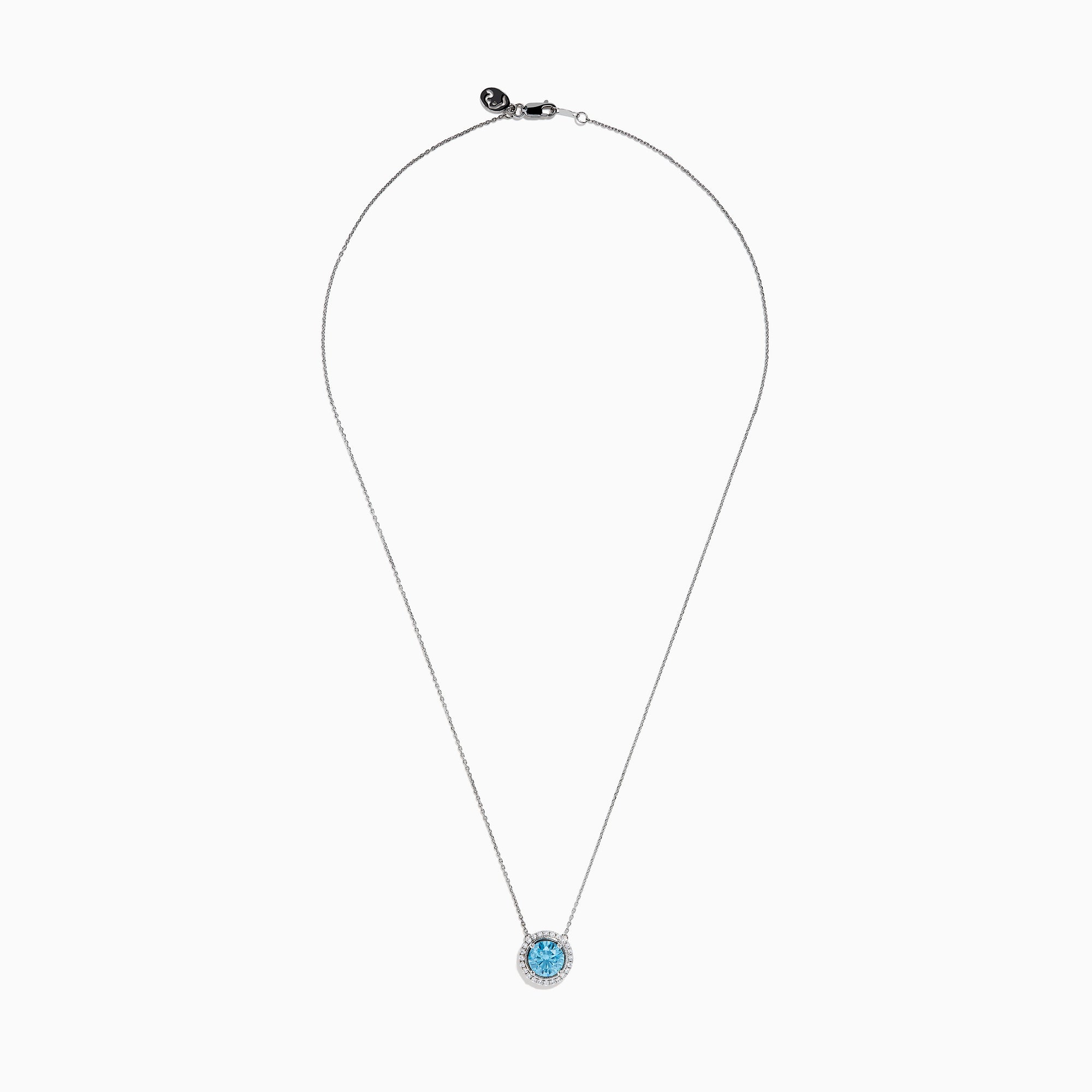 The Lab Grown Blue and White Diamond Halo Necklace in 14K White Gold features a round blue gemstone pendant encircled by sparkling lab grown diamonds, shown against a white background.