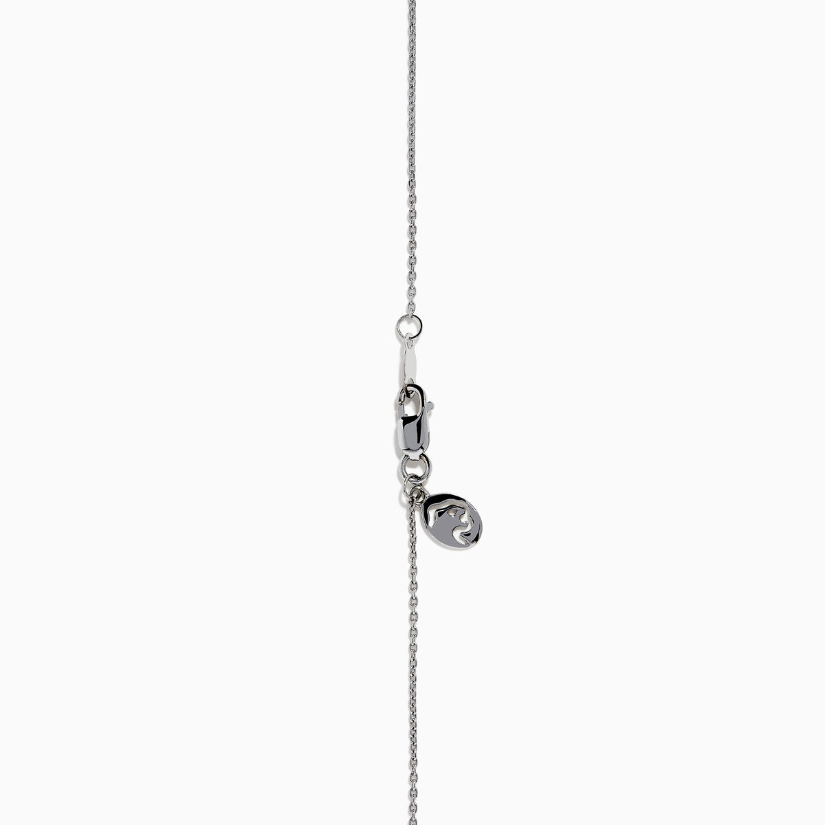 The Lab Grown Blue and White Diamond Halo Necklace in 14K White Gold features a round blue gemstone pendant encircled by sparkling lab grown diamonds, shown against a white background.
