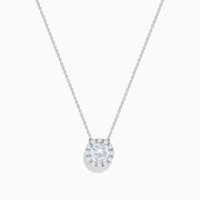 The 14K White Gold Lab Grown Diamond Pendant features a delicate silver chain and a round, sparkling lab grown diamond in an elegant white gold setting, shown against a white background.