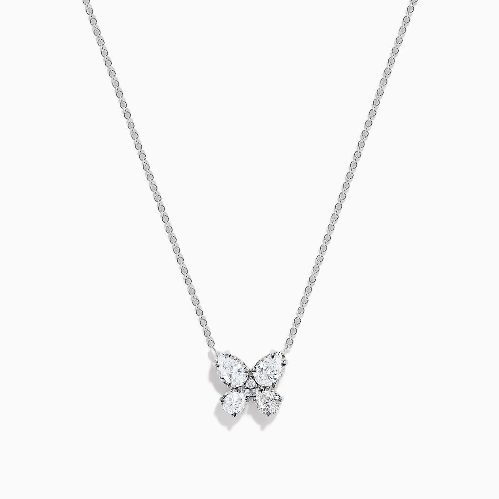 The Lab Grown Pear and Round Diamond Butterfly Pendant in 14K White Gold features four clear, pear-cut lab-grown diamonds set on a delicate silver chain, creating an elegant butterfly that sparkles beautifully.