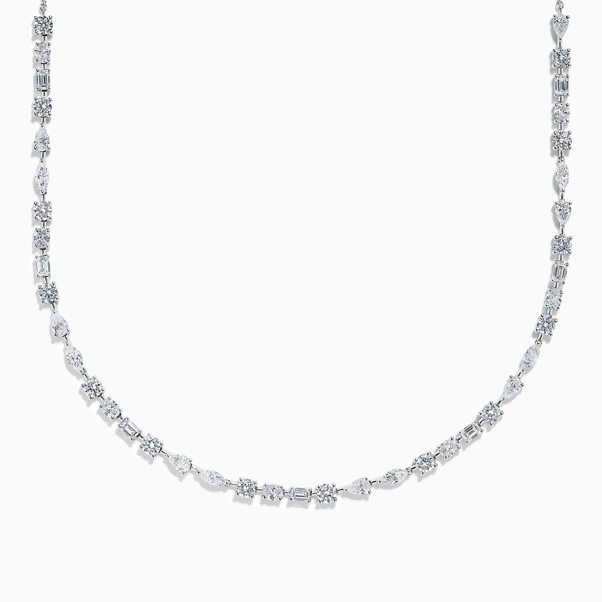 The Lab Grown Multi Shape Diamond 7.25ct Tennis Necklace in 14K White Gold features round, marquise, and emerald cut lab-grown diamonds arranged evenly along the chain and is shown gracefully curved on a white background.