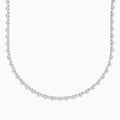 The Lab Grown Diamond Tennis Necklace in 14K White Gold showcases a continuous row of closely set round lab grown diamonds, elegantly displayed on a plain white background.