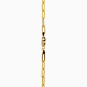 The Lab Grown Round Bezel-Set Diamond Paperclip Chain Necklace in 14K Yellow Gold features elongated oval links and a round, clear lab grown diamond pendant, shown against a white background.