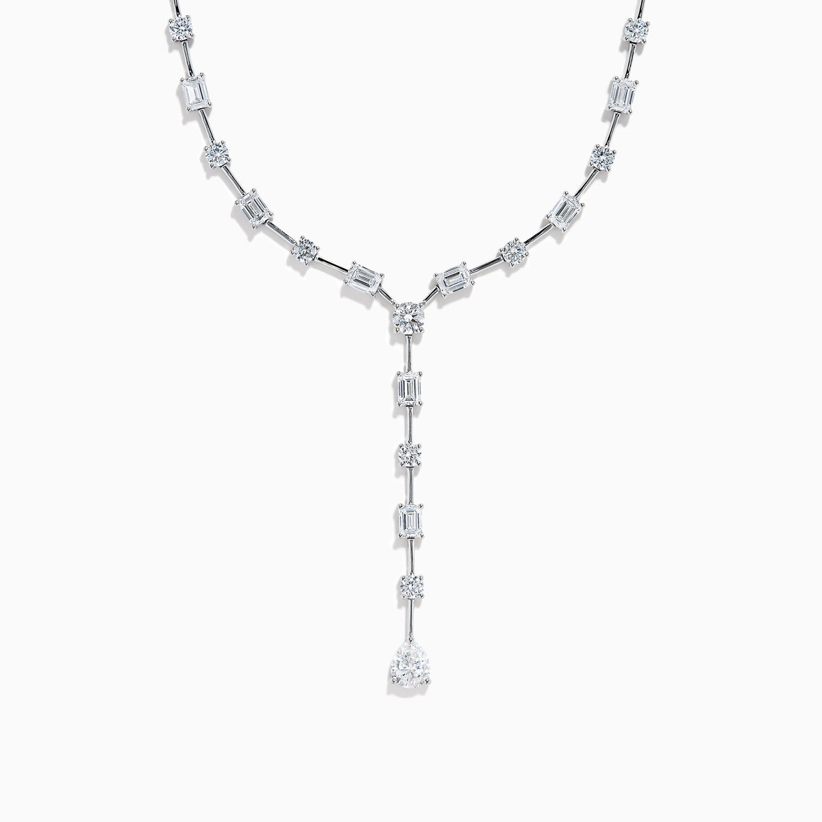 The Lab Grown Diamond Lariat Tennis Necklace in 14K White Gold showcases alternating round and rectangular lab grown diamonds, ending with a pear-shaped drop for an elegant, symmetrical look.