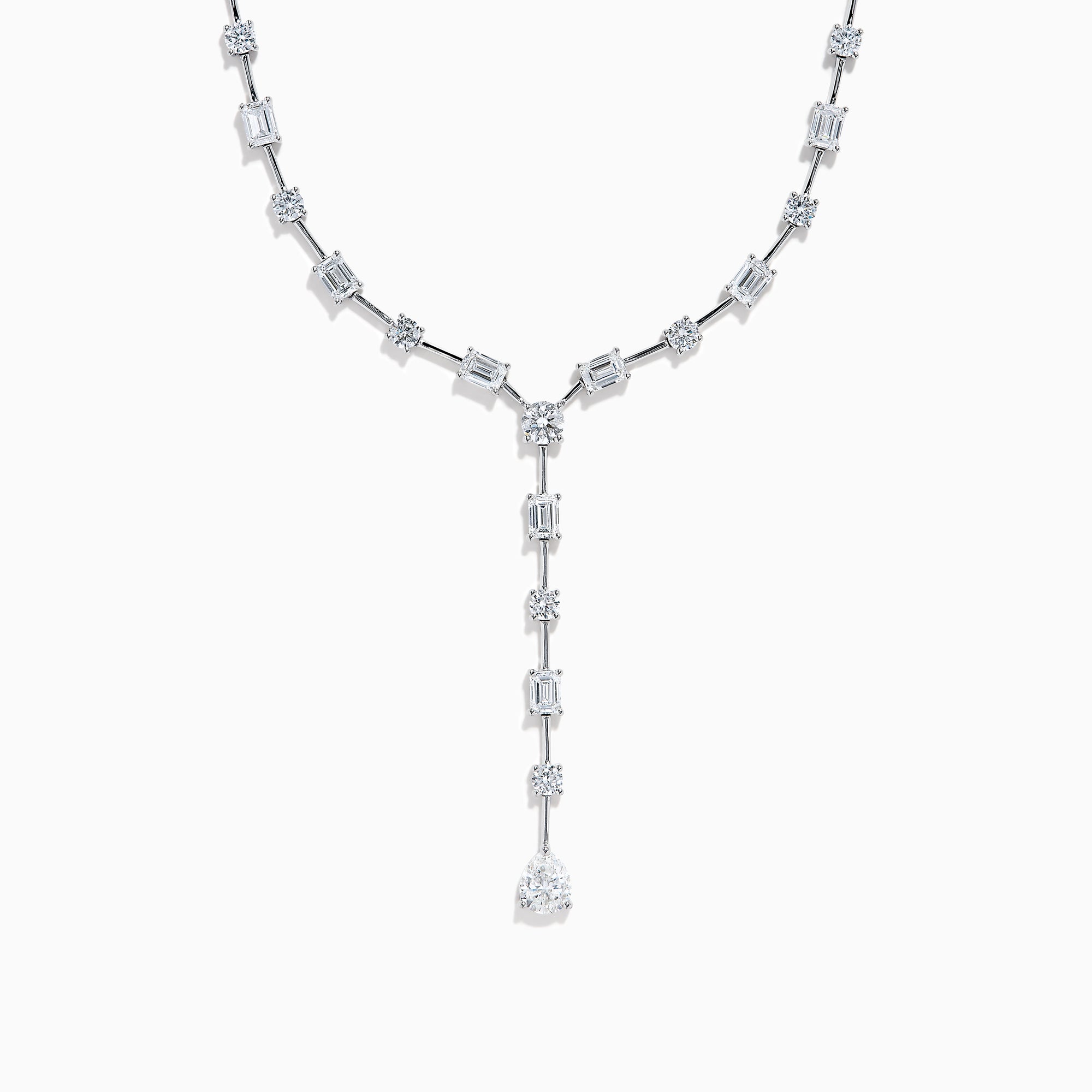 The Lab Grown Diamond Lariat Tennis Necklace in 14K White Gold showcases alternating round and rectangular lab grown diamonds, ending with a pear-shaped drop for an elegant, symmetrical look.