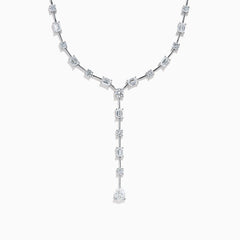 The Lab Grown Diamond Lariat Tennis Necklace in 14K White Gold showcases alternating round and rectangular lab grown diamonds, ending with a pear-shaped drop for an elegant, symmetrical look.