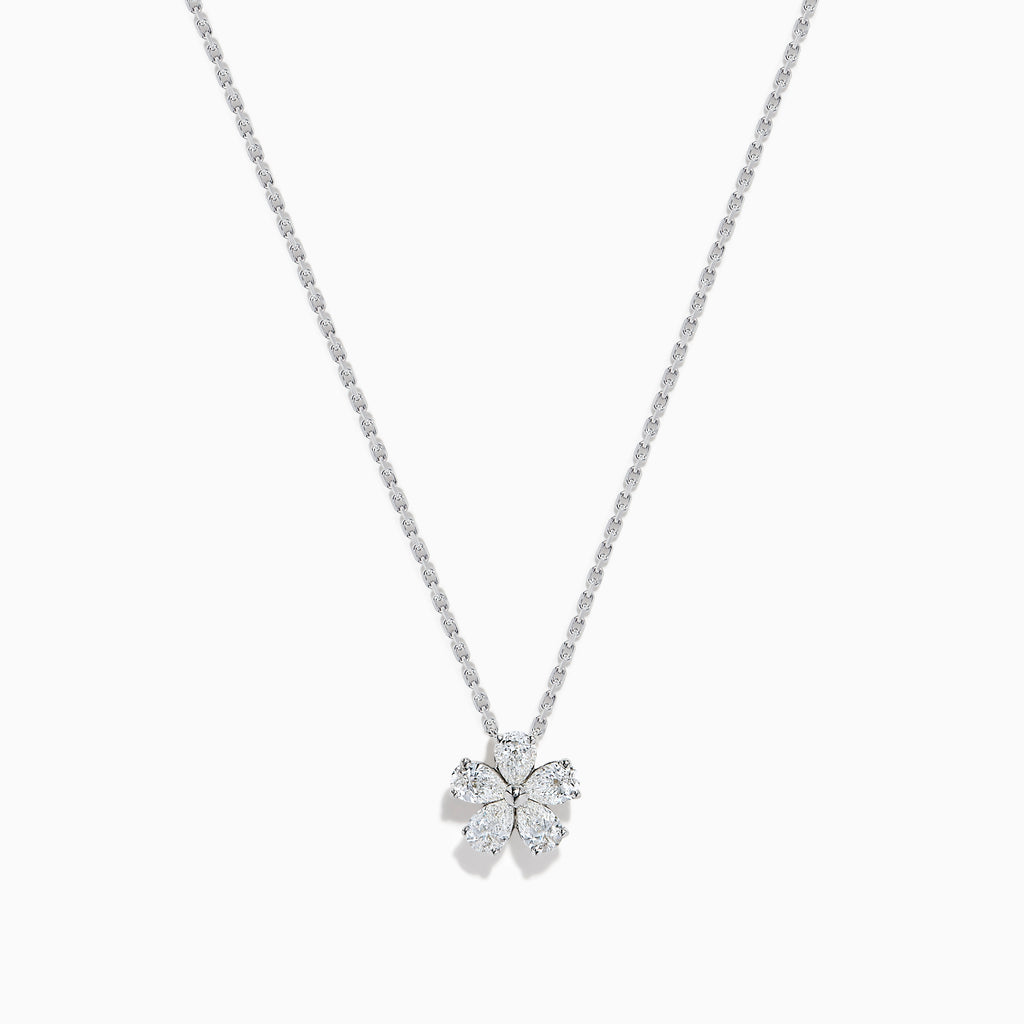 The Lab Grown Pear Diamond Flower Pendant in 14K White Gold features six lab-grown pear diamonds as petals, elegantly set on a delicate white gold chain and displayed against a white background.