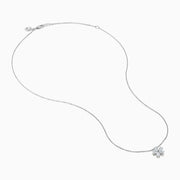 The Lab Grown Pear Diamond Flower Pendant in 14K White Gold features six lab-grown pear diamonds as petals, elegantly set on a delicate white gold chain and displayed against a white background.