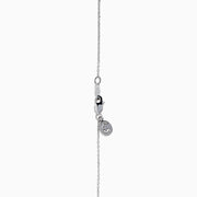 The Lab Grown Pear Diamond Flower Pendant in 14K White Gold features six lab-grown pear diamonds as petals, elegantly set on a delicate white gold chain and displayed against a white background.