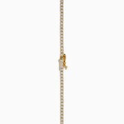 The Lab Grown Diamond 4.9ct Tennis Necklace in 14K Yellow Gold features small, evenly spaced lab grown diamonds in a continuous sparkling line, shown against a plain white background.