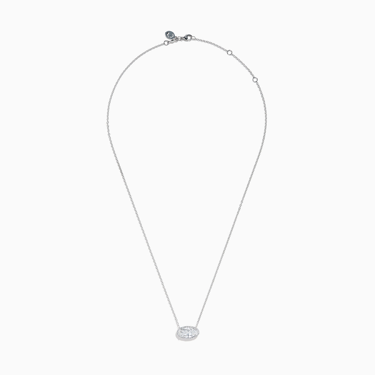 The Lab Grown Diamond East-West Oval Halo Necklace in 14K White Gold showcases a clear lab grown diamond pendant encircled by sparkling stones in an elegant halo setting.
